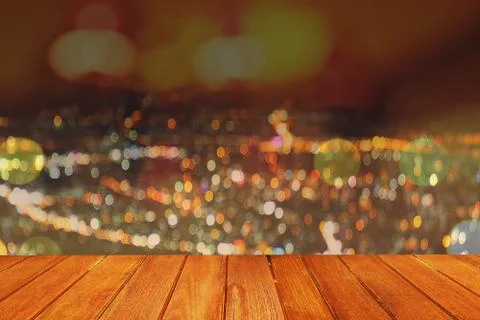 Bokeh background with empty wooden table Stock Photos