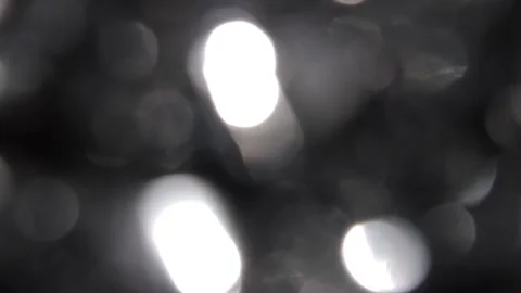 Bokeh background video with silver moving to the left 動画素材 318366380