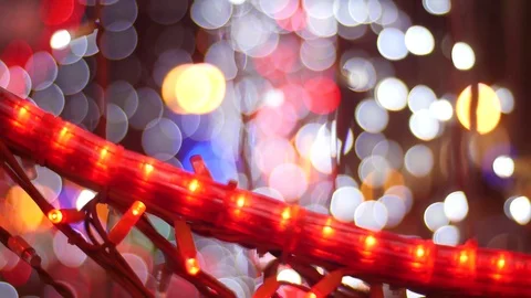 Bokeh on a black background white, red, orange. Soft focus, bokeh. Video stock 84125044