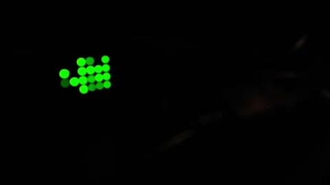 Bokeh of blinking green LED light showing network activity on network switch Stock Footage 100621659