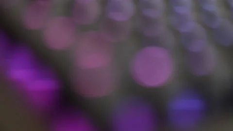 Bokeh Blur On A Black Background With Bright Led Rays Of Colored Light Stock Footage 201243122