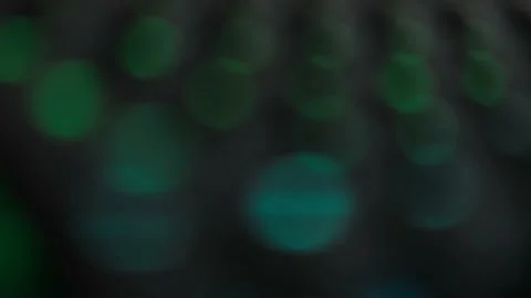 Bokeh Blur On A Black Background With Bright Led Rays Of Colored Light Stock Footage 201243139