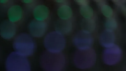Bokeh Blur On A Black Background With Bright Led Rays Of Colored Light Stock Footage 201243197