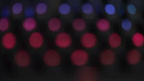 Bokeh Blur On A Black Background With Bright Led Rays Of Colored Light Stock Footage 201243220