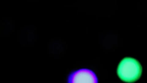Bokeh blur on a black background colored LED rays. Stock Footage 154134945