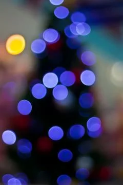 Bokeh blurred out of focus background christmas fir tree Stock Photos