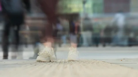 Bokeh blurred time-lapse people crowd walking crosswalk, rush hour fast motion Stock Footage 304285751