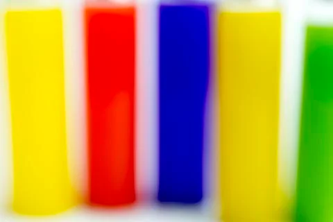 Bokeh from bright colors in the flasks. Stock Photos