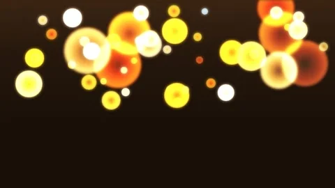 Bokeh circles in warm tones on dark background. 2d animation Stock Footage 343357041