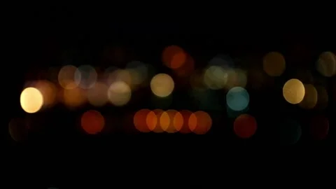 Bokeh in dark blurry background at night, Bokeh of city lights, Defocused night  Stock Footage 232291731