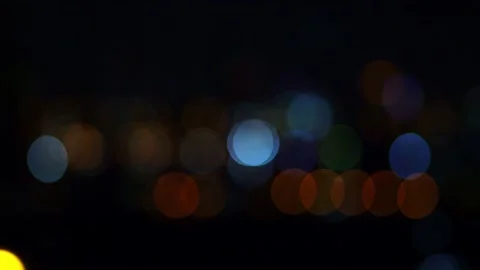 Bokeh in dark blurry background at night, Bokeh of city lights, Defocused night  Stock Footage 232830304