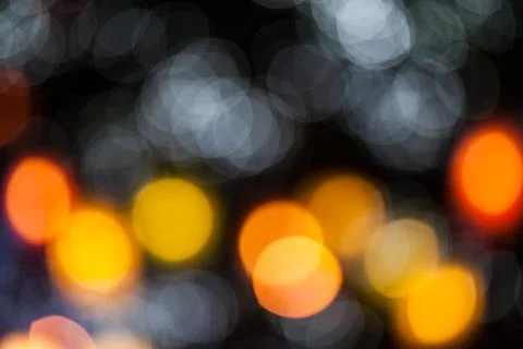 Bokeh effect background of decoration on tree by party light Stock Photos