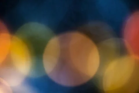 Bokeh effect background of decoration on tree by party light Stock Photos