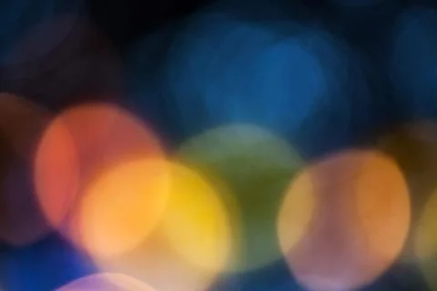 Bokeh effect background of decoration on tree by party light Stock Photos