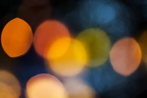 Bokeh effect background of decoration on tree by party light Stock Photos