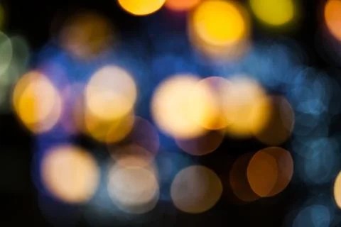 Bokeh effect background of decoration on tree by party light Stock Photos