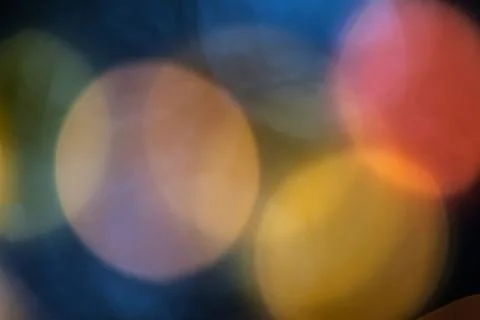 Bokeh effect background of decoration on tree by party light Stock Photos