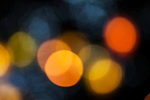 Bokeh effect background of decoration on tree by party light Stock Photos