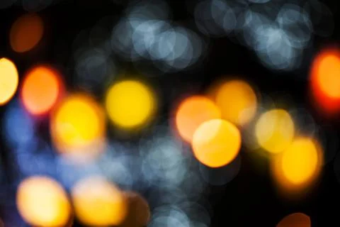 Bokeh effect background of decoration on tree by party light Stock Photos