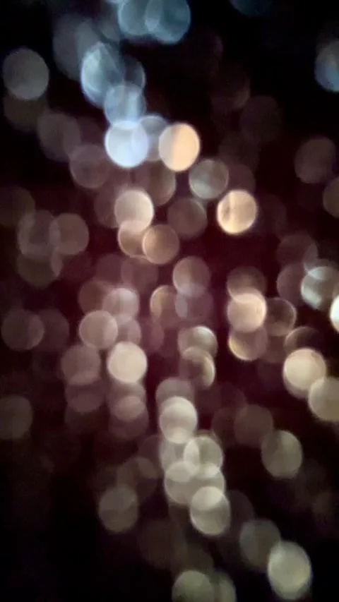 Bokeh effect on a black background Stock Footage 324502165