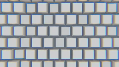 A bokeh effect on the keyboard of white typed backlit keys. Seamless loop. Stock Footage 125351518