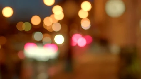 Bokeh effects and warm glow evoke tranquil urban evening ambiance Stock Footage 324591759