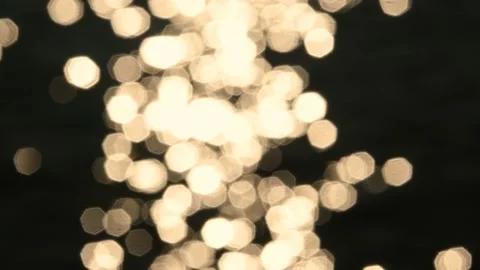 Bokeh expresses sunlight shining in the river Vidéo 122632401
