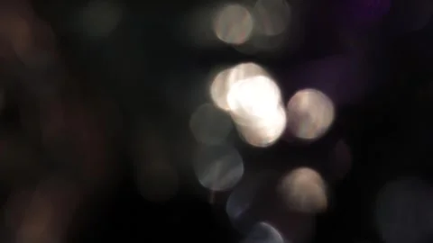 Bokeh flare in the dark Stock Footage 317458264