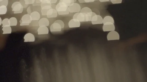 Bokeh formed from white source of light Stock Footage 79786416