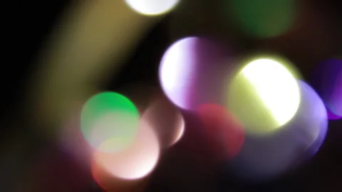 Bokeh glow in different sizes of brilliant colors Stock-Footage 309611654