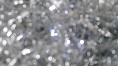 Bokeh. Glowing silver defocused lights. Christmas background. Video stock 159603148