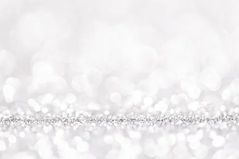Bokeh gray background. Silver abstract bokeh snow falling winter christmas Stock Photos