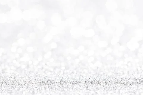 Bokeh gray background. Silver abstract bokeh snow falling winter christmas Stock Photos