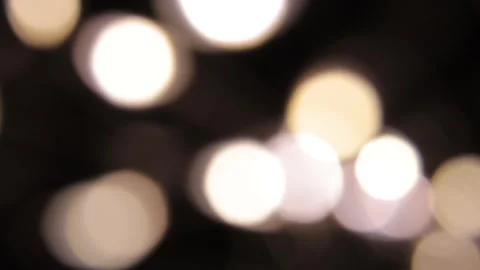 Bokeh from a group moving up and down at the same time Vídeos de archivo 317489032