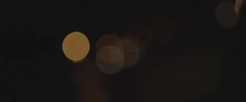 BOKEH - HEADLIGHTS - WIPERS - RAIN - SLOW-MO - NIGHT Stock Footage 165623052