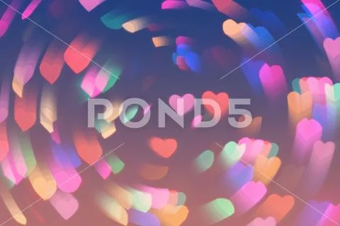 Bokeh hearts lights whirl romantic background pink Stock Photos