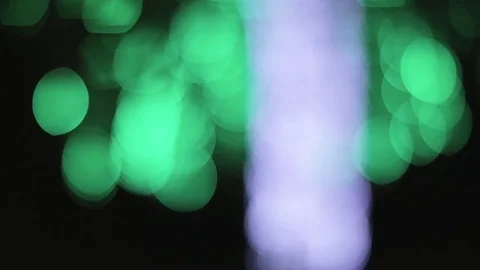 Bokeh from illuminated tree at night. Видео 76736040