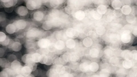 Bokeh image, white and black spheres. Of sea waves Stock Footage 131967568