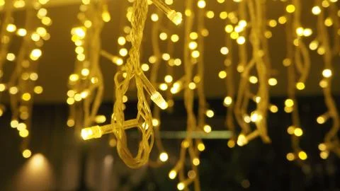 Bokeh images circle bubbles shape yellow color of little LED Light bulb. Stock Photos