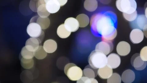 Bokeh images circle bubbles shape blue and light yellow color on black backgr Foto stock