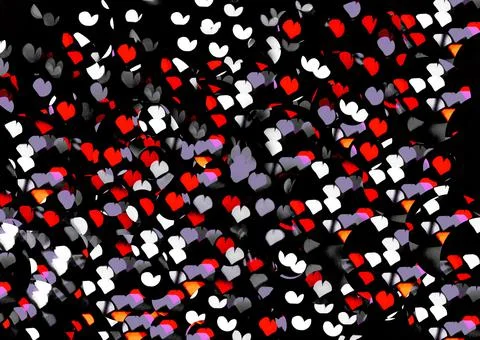 Bokeh of light in the form of bright colored hearts Stock Photos