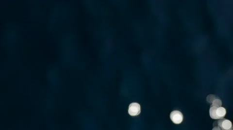 Bokeh light particles on black background Stock Footage 68148116