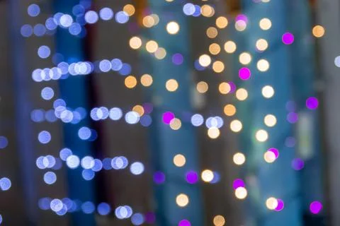 Bokeh light pattern for digital design - soft glowing orbs in purple gold blue Stock Photos