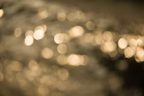 Bokeh of light reflected on water. Stock Photos