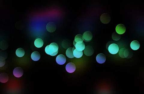 Bokeh lights as background on black Stockfoto's