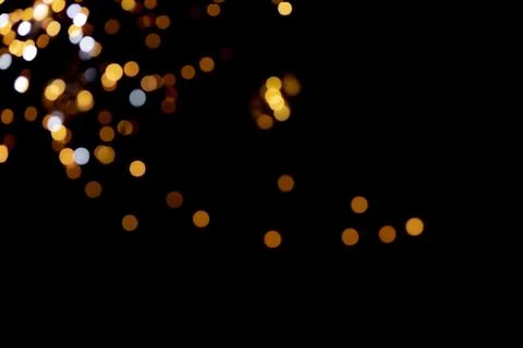 Bokeh lights on black background Stock Photos
