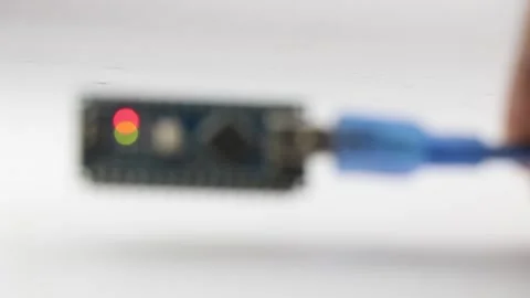Bokeh lights from a blinking programmable microcontroller board Stock Footage 201615583