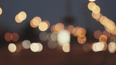 Bokeh Lights Of City Traffic At Night, Creating A Colorful Urban Scene. Stock Footage 303017553