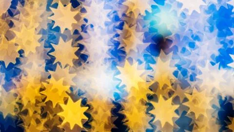 Bokeh of lights on defocused background in a form of suns Stock Photos