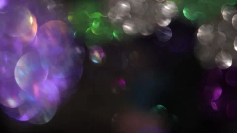 Bokeh lights with light particles of different sizes and colors Video stock 318363076